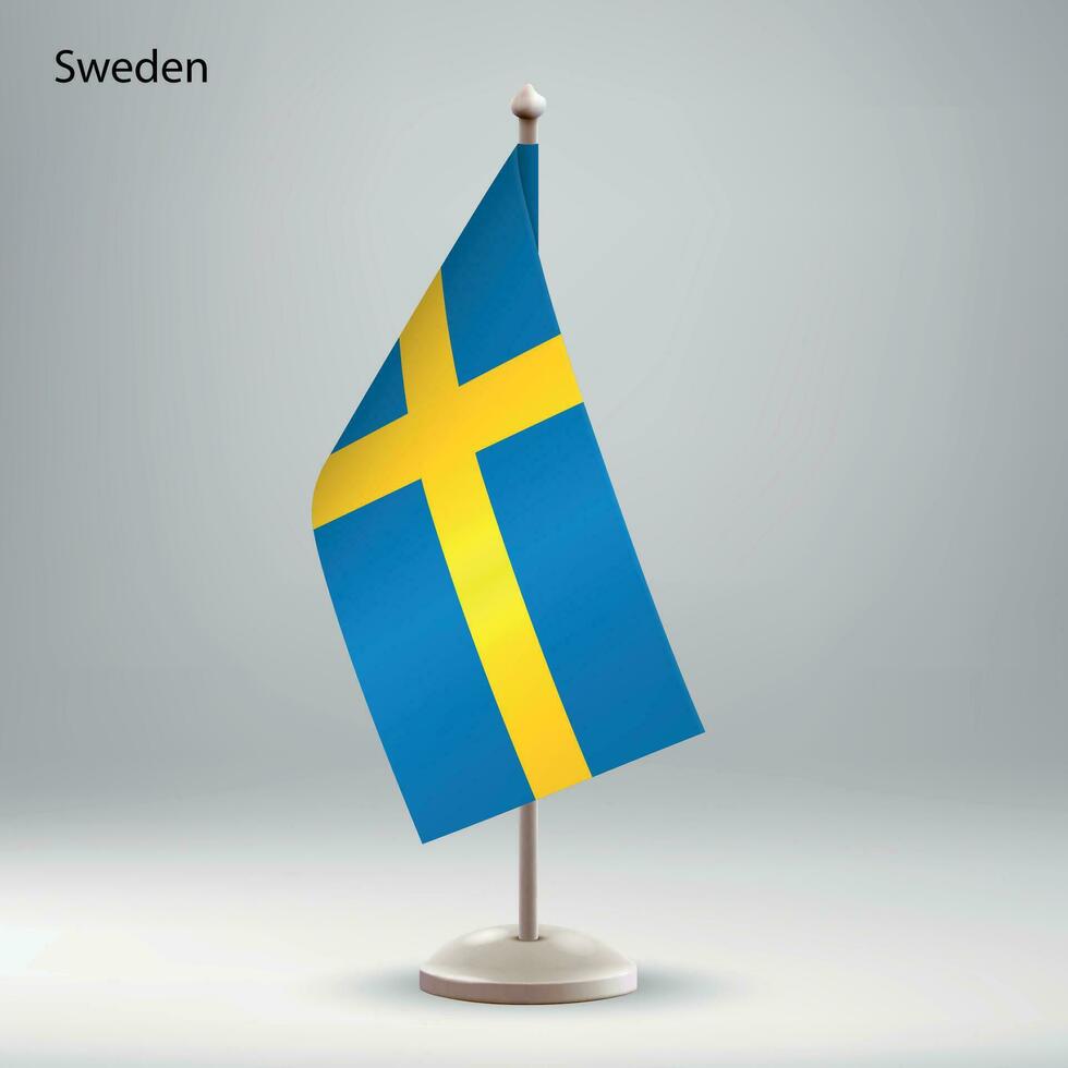 Flagge von Schweden hängend auf ein Flagge Stand. vektor