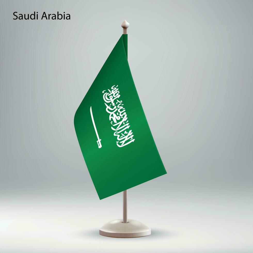 Flagge von Saudi Arabien hängend auf ein Flagge Stand. vektor