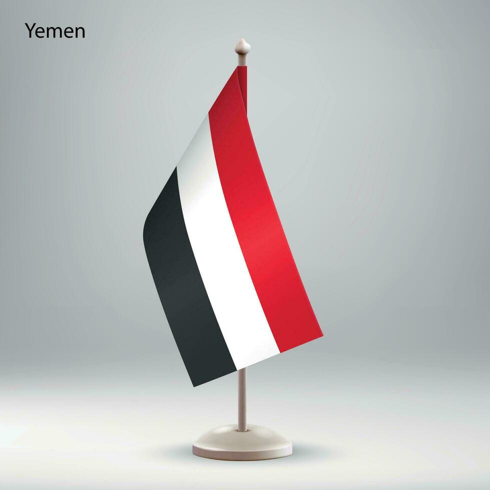 Flagge von Jemen hängend auf ein Flagge Stand. vektor