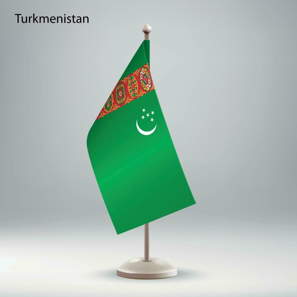 Flagge von Turkmenistan hängend auf ein Flagge Stand. vektor