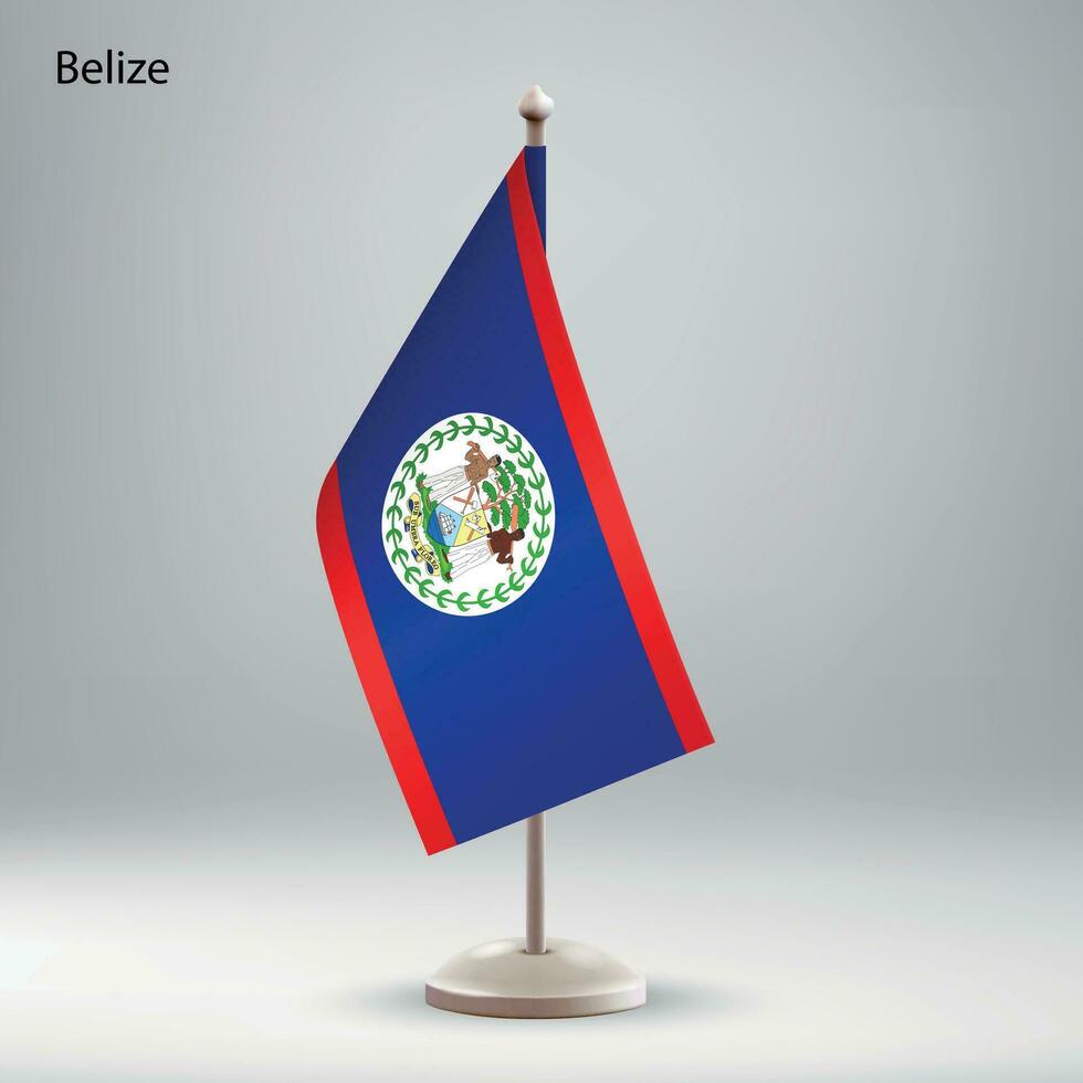 Flagge von belize hängend auf ein Flagge Stand. vektor