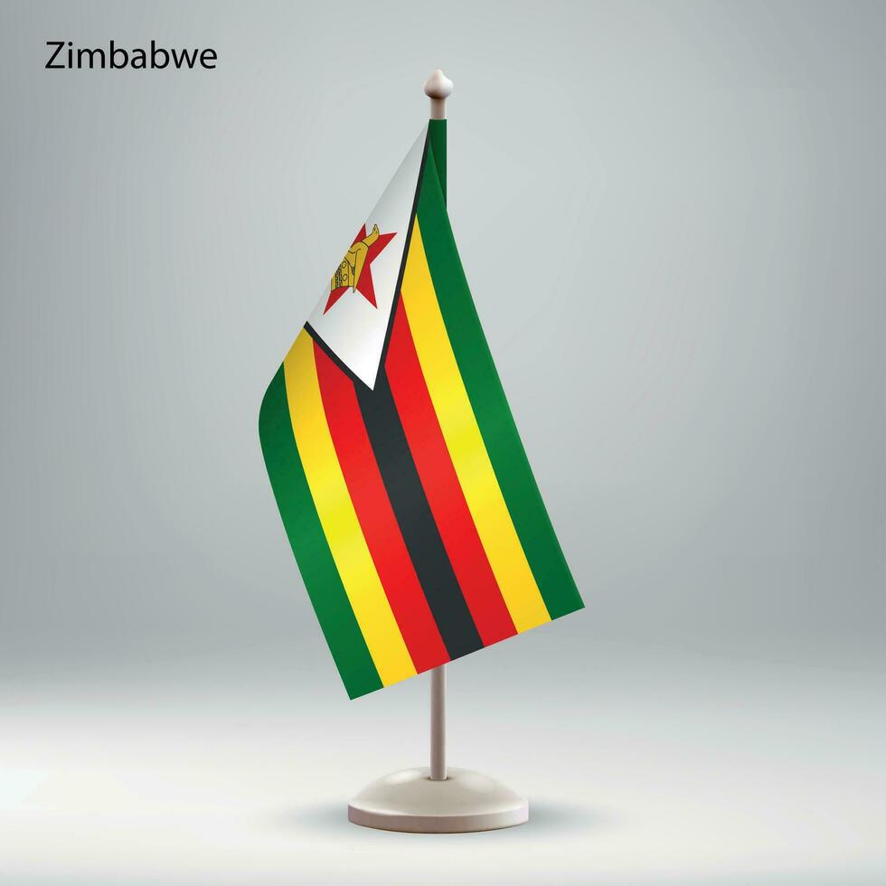 Flagge von Zimbabwe hängend auf ein Flagge Stand. vektor