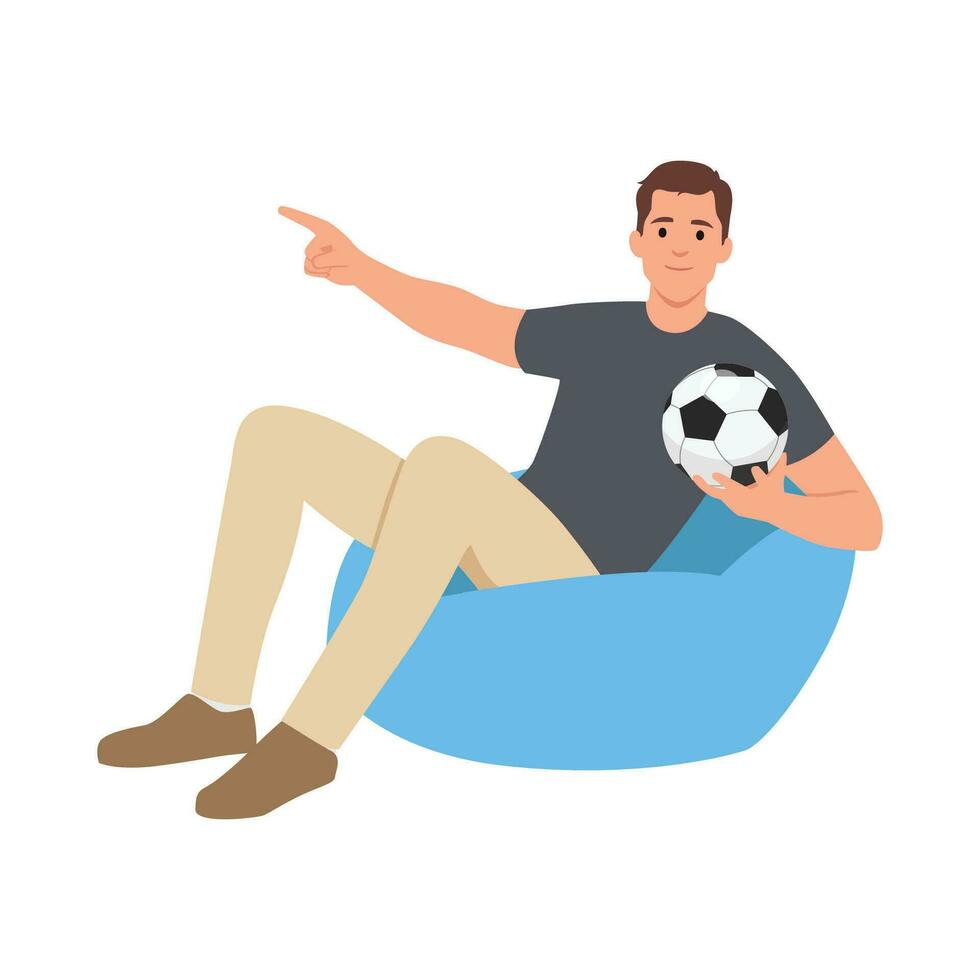 jung Mann Unterstützung Fußball Sport Mannschaft halt Fußball Ball Uhr Fernseher Leben Strom sitzen im Tasche Stuhl Punkt Index Finger beiseite. vektor