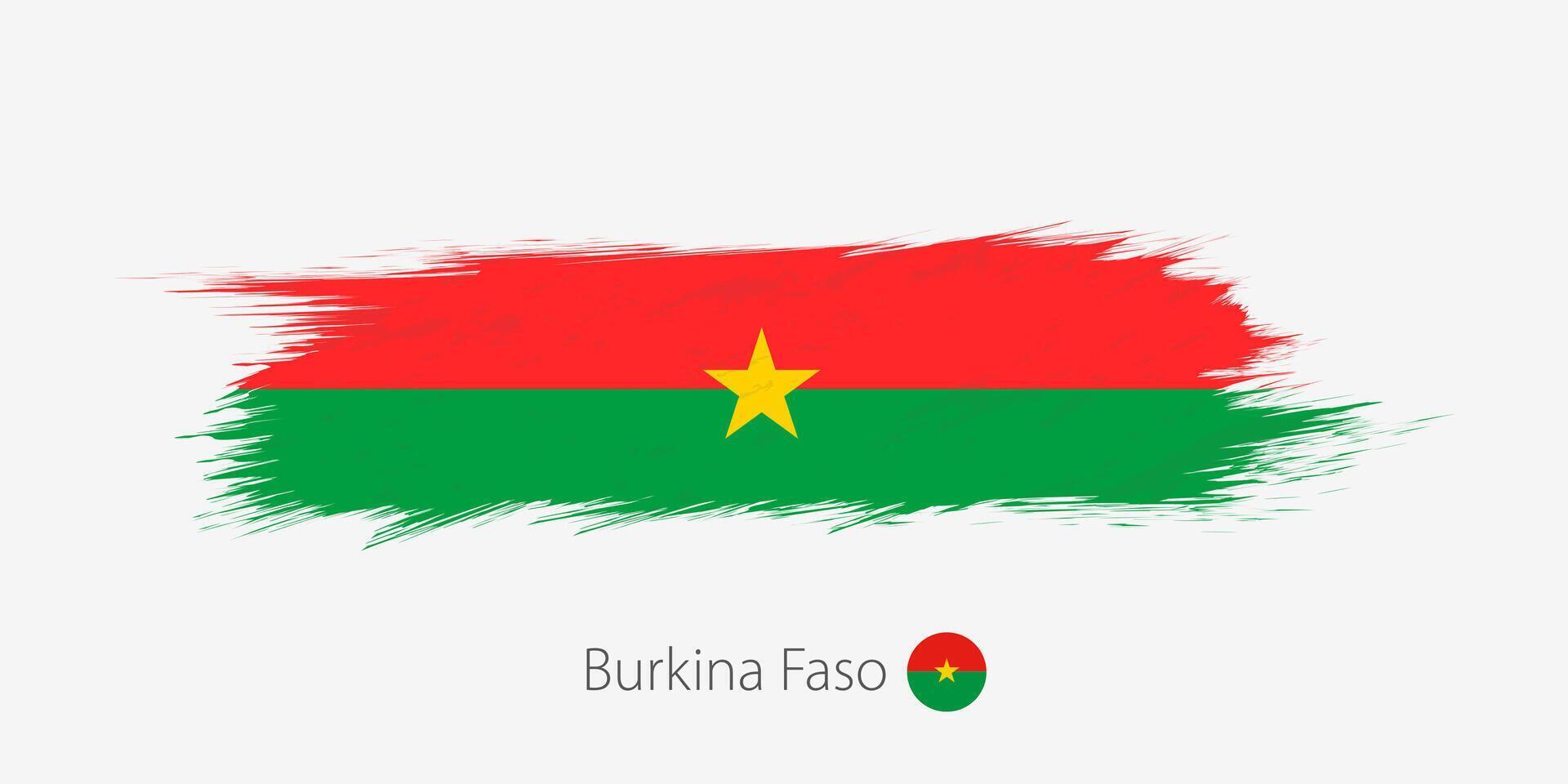 flagga av Burkina faso, grunge abstrakt borsta stroke på grå bakgrund. vektor