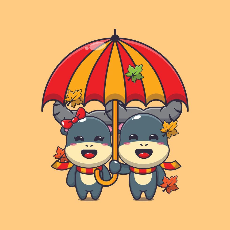 süß Paar Büffel mit Regenschirm beim Herbst Jahreszeit. vektor