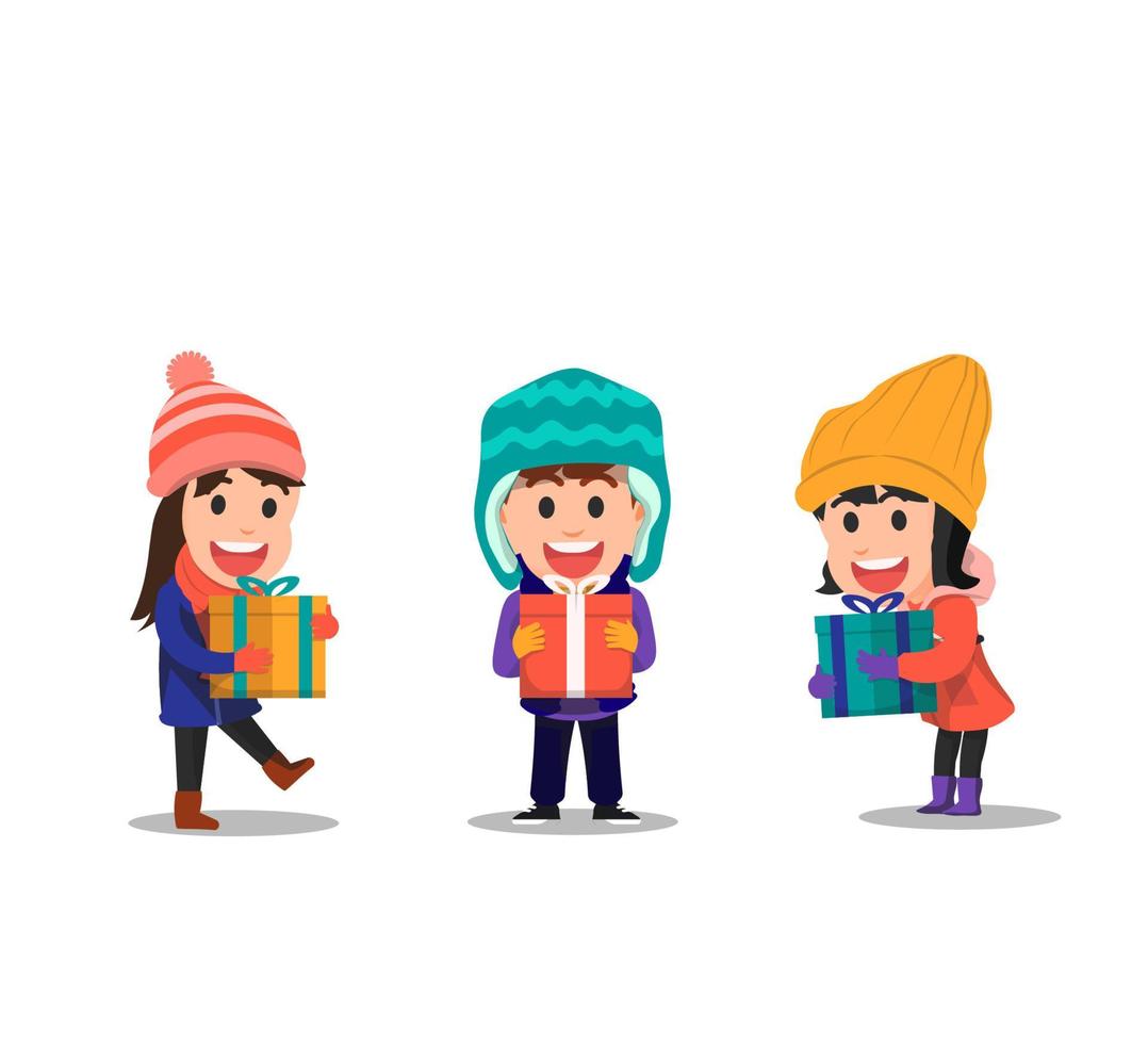 drei Kinder, die Geschenkboxen in Winterkleidung halten vektor