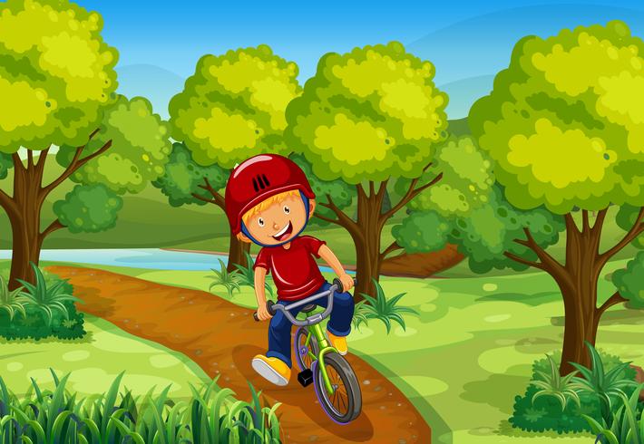 Liten pojke cykla i parken vektor