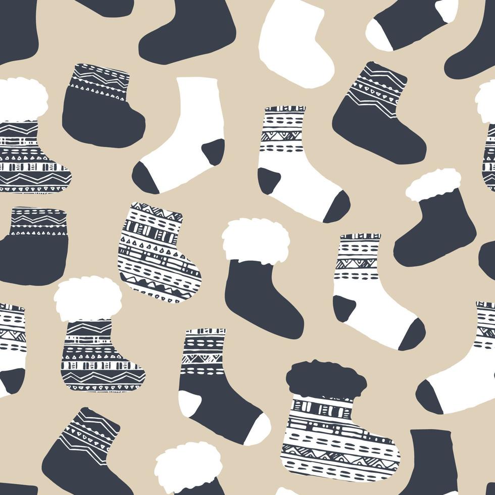 nahtloses Muster von gestrickten Socken. Vektor-Illustration für Weihnachten Winterzeit in blau-weiß-beige Farben vektor