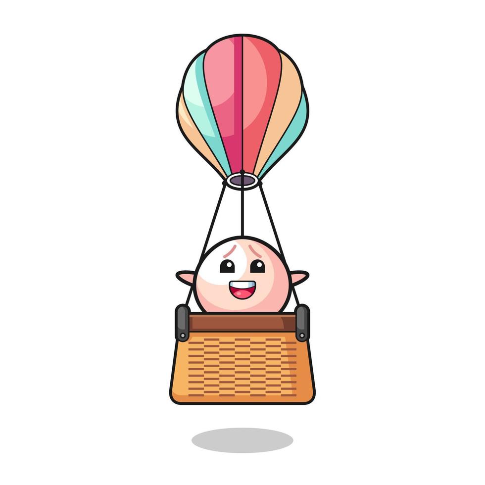 köttbullemaskot som rider på en luftballong vektor