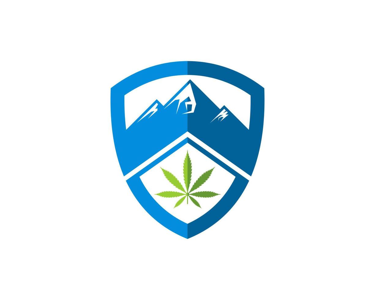 sköld med berg och grönt cannabisblad vektor