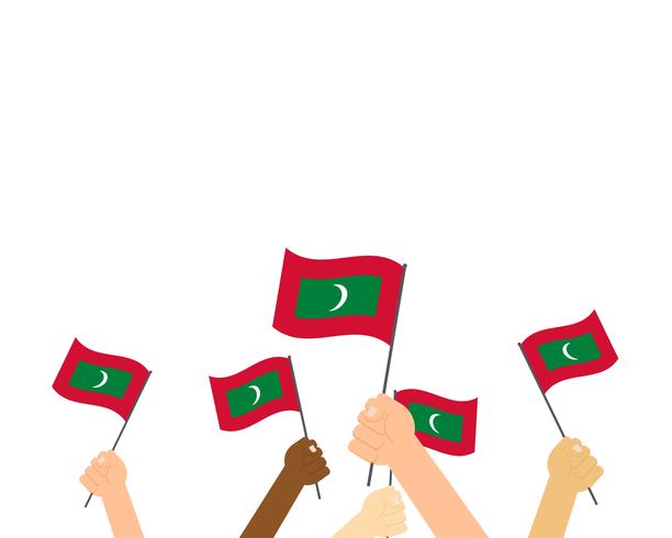 Vector Illustration von den Händen, die Malediven-Flaggen lokalisiert auf weißem Hintergrund halten