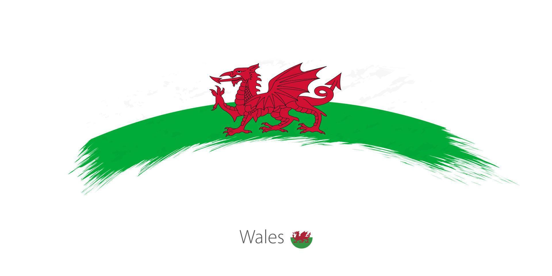 wales flagga i rundad grunge penseldrag. vektor