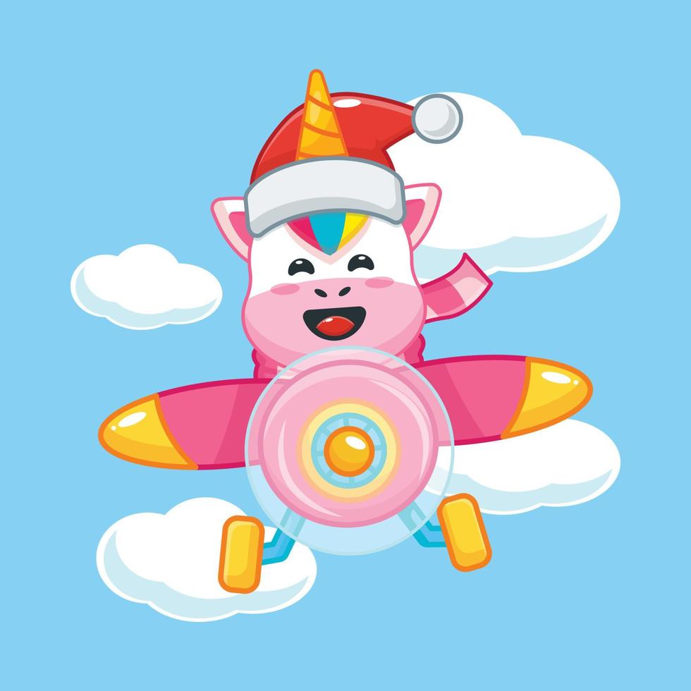 süße einhorn-zeichentrickfigur mit weihnachtsmütze fliegt mit dem flugzeug vektor