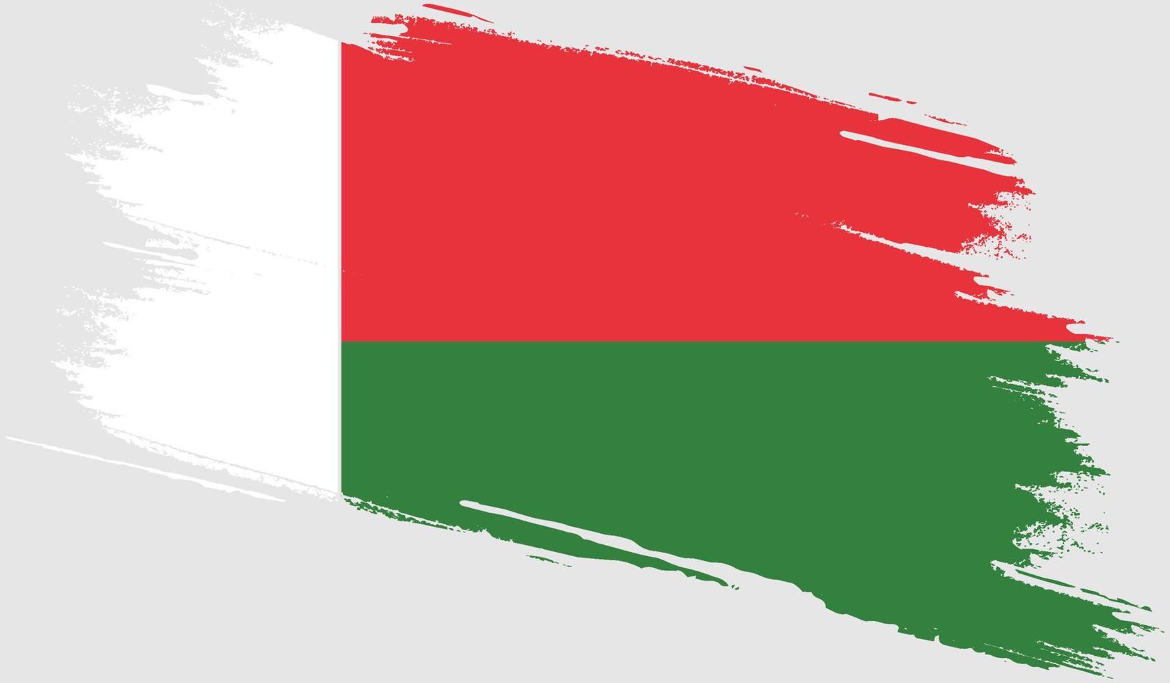 Madagaskar-Flagge mit Grunge-Textur vektor