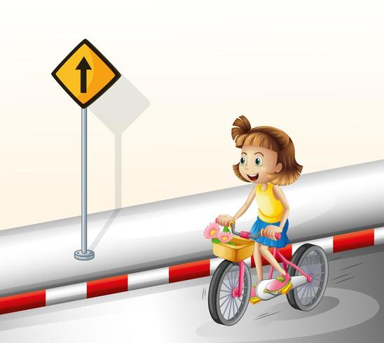 En flicka som cyklar på vägen vektor