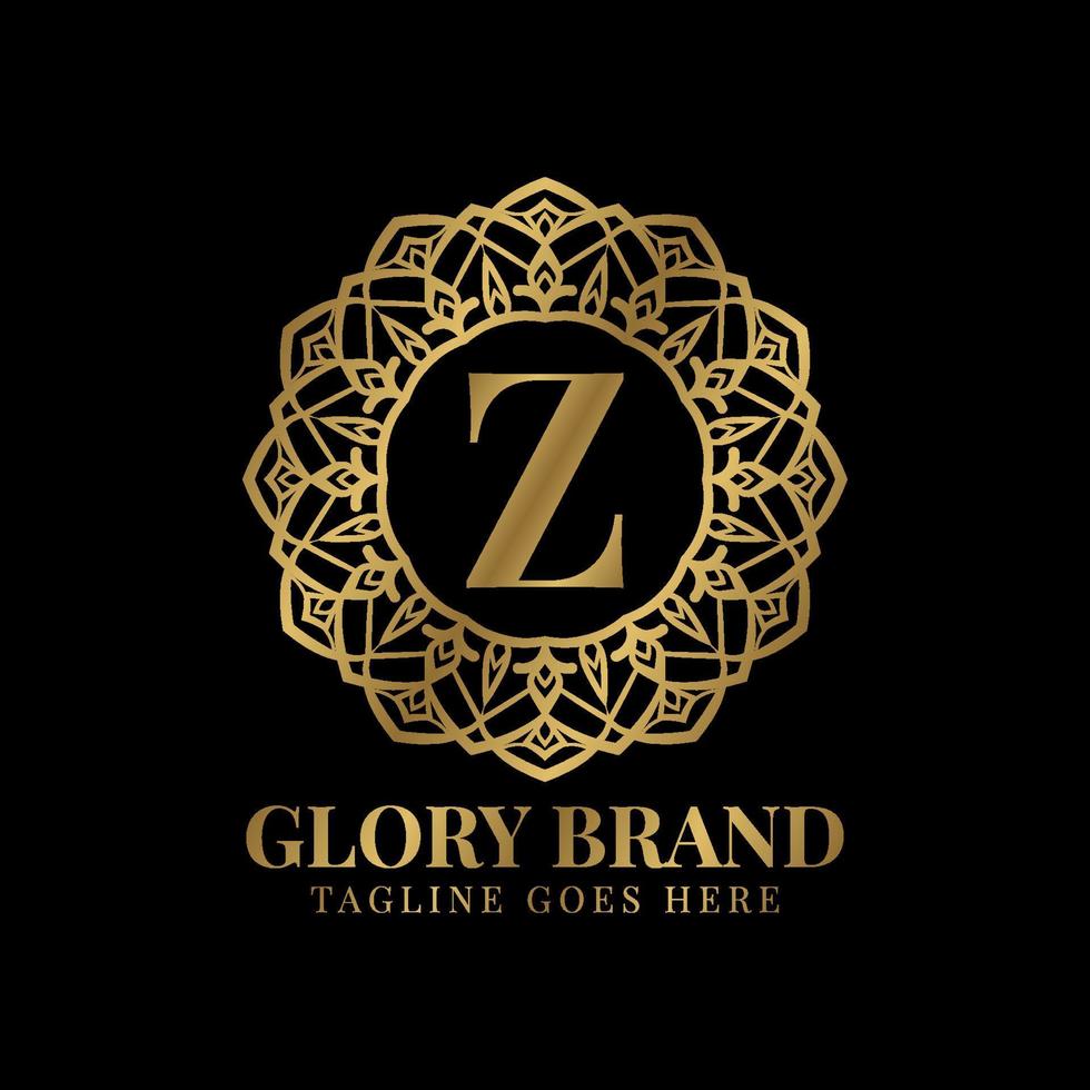 bokstaven z glory mandala vintage gyllene färg lyx vektor logotyp design