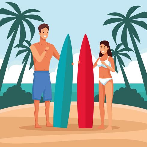 Junges Paar am Strand mit Surfbrettern vektor