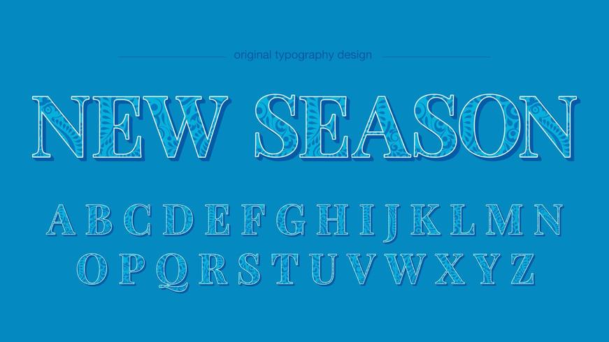 Blaue Blumenmuster-Versalien-Typografie vektor