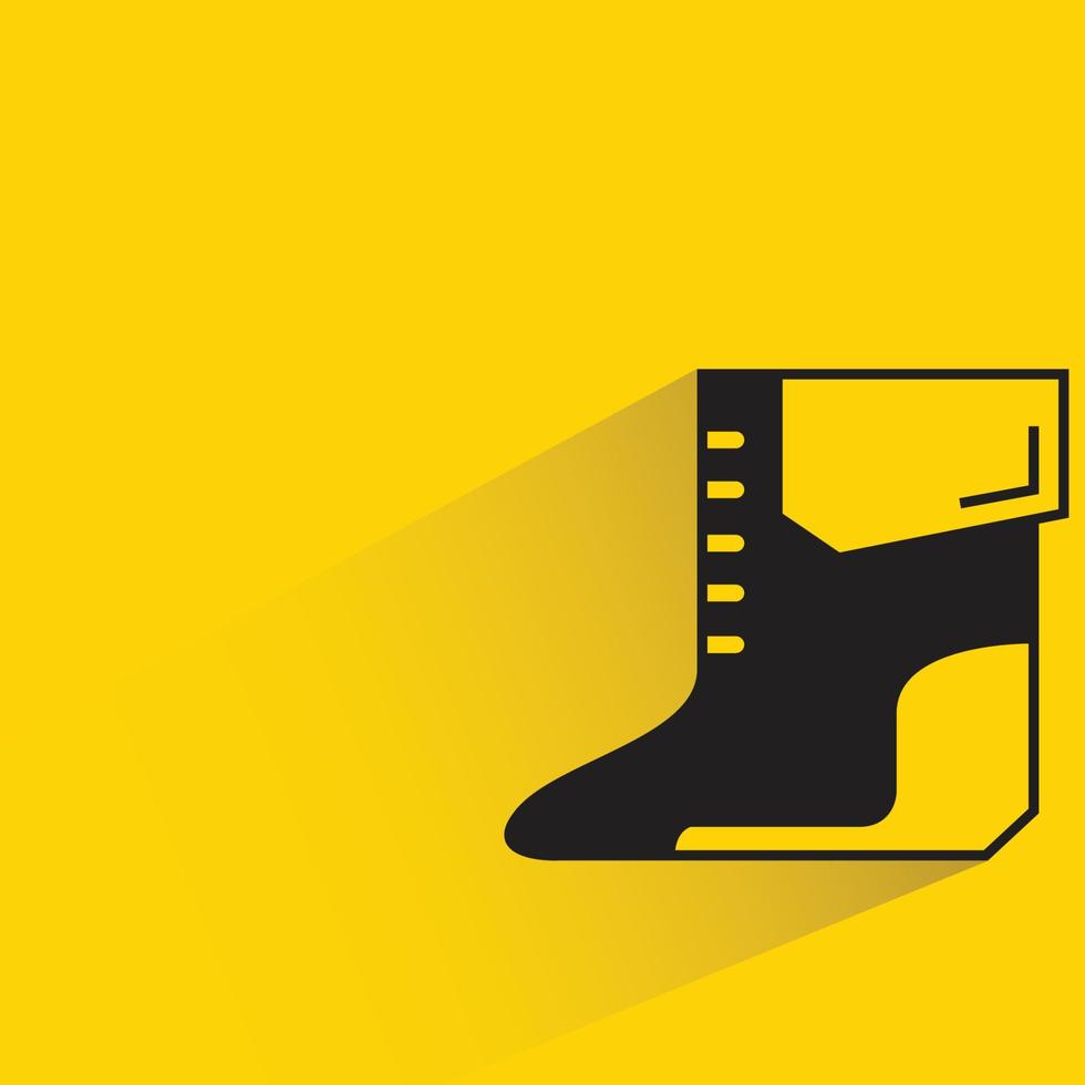 Mode-Stiefel-Symbol auf gelbem Hintergrund vektor