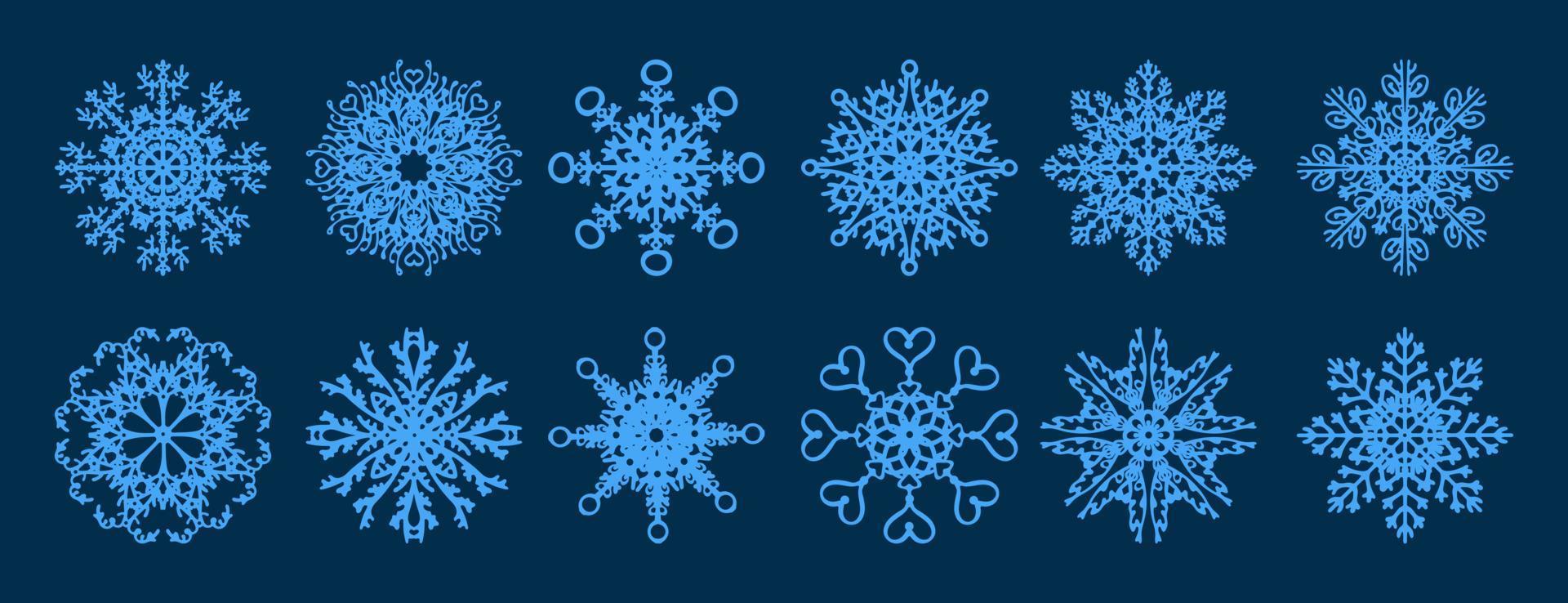 Schneeflocken-Vektorsammlung für Winterdesign isoliert auf blauem Hintergrund. vektor