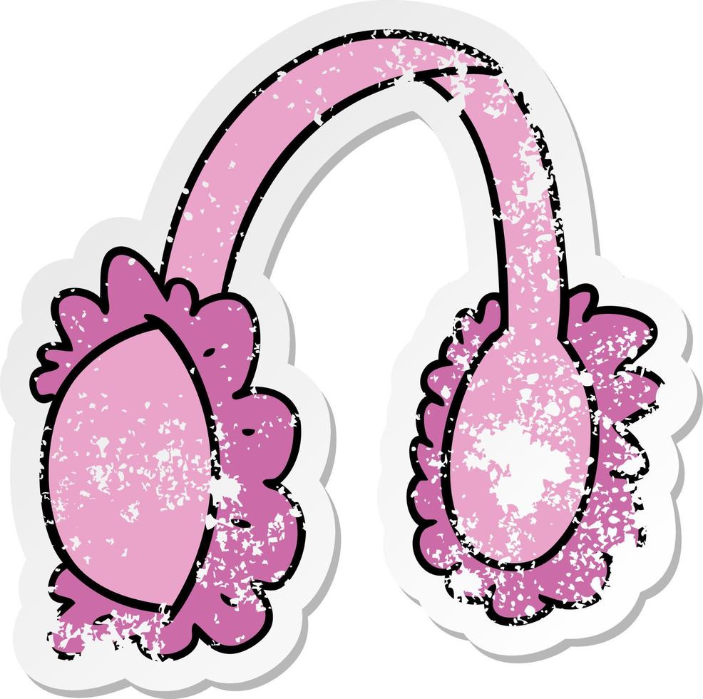 Distressed Sticker Cartoon Doodle von rosa Ohrenschützern vektor