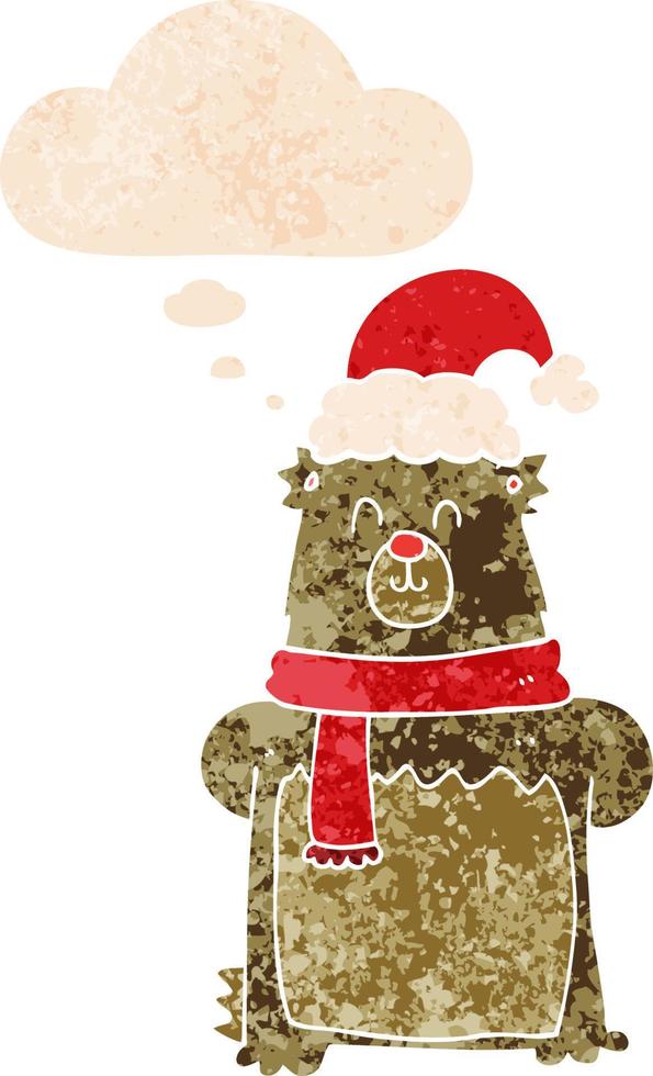 tecknad björn bär julhatt och tankebubbla i retro texturerad stil vektor