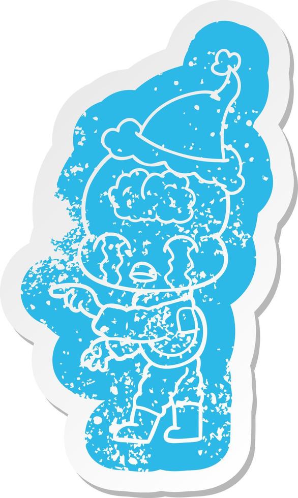 Cartoon-Distressed-Aufkleber eines großen Gehirn-Aliens, der weint und mit Weihnachtsmütze zeigt vektor