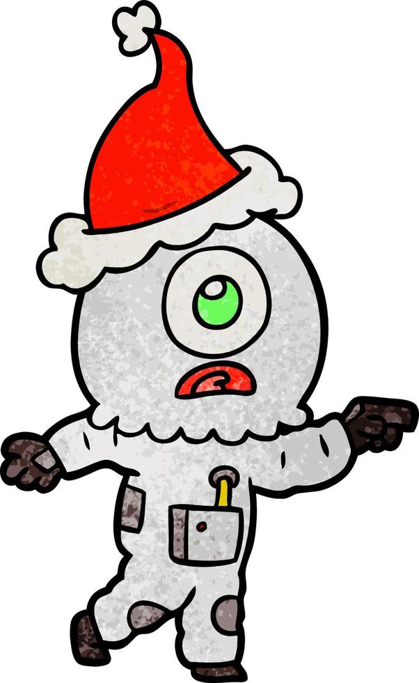 texturierter Cartoon eines Zyklopen-Alien-Raumfahrers, der mit Weihnachtsmütze zeigt vektor