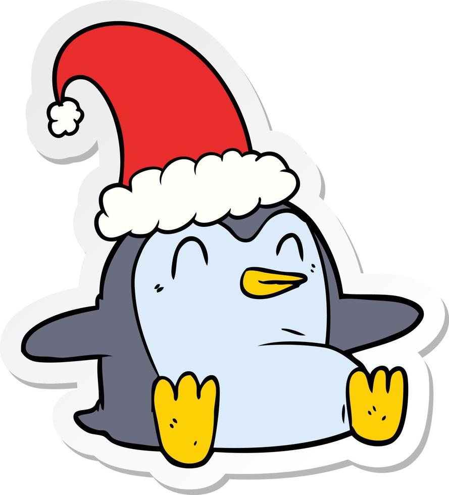 Aufkleber eines Cartoon-Pinguins mit Weihnachtsmütze vektor