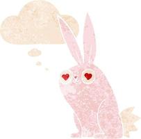 tecknad bunny kanin i kärlek och tankebubbla i retro texturerad stil vektor