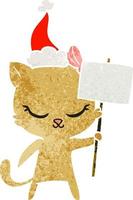 niedlicher Retro-Cartoon einer Katze mit Schild mit Weihnachtsmütze vektor