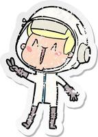 beunruhigter Aufkleber eines fröhlichen Cartoon-Astronauten, der ein Friedenszeichen gibt vektor