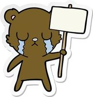 Aufkleber eines weinenden Zeichentrickbären mit Schild vektor