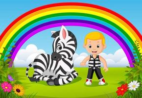söt pojke och zebra i parken med regnbågsscenen