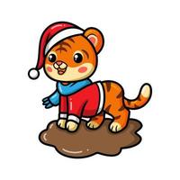 niedlicher Baby-Tiger-Cartoon mit Weihnachtsmütze vektor