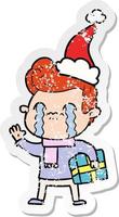 beunruhigter Aufkleber-Cartoon eines Mannes, der mit Weihnachtsmütze weint vektor