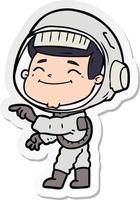 klistermärke av en glad tecknad astronaut vektor
