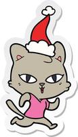 klistermärke tecknad serie av en katt ut för en springa bär santa hatt vektor
