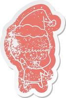 Happy Cartoon Distressed Aufkleber eines Jungen, der mit Weihnachtsmütze winkt vektor