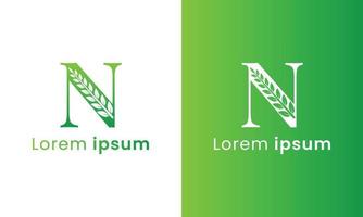 buchstabe n logo mit einem kreativen monogrammblattkonzept für das grüne ökounternehmen vektor