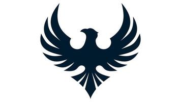 de logotyp av en svart fågel med vingar pekande uppåt isolerat på en vit bakgrund.örn logotyp. vektor