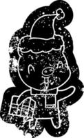 Fröhliche Cartoon-Distressed-Ikone eines Schweins mit Weihnachtsgeschenk mit Weihnachtsmütze vektor