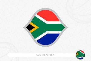 südafrika-flagge für basketballwettbewerb auf grauem basketballhintergrund. vektor