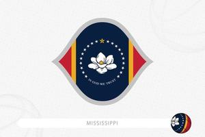 mississippi-flagge für basketballwettbewerb auf grauem basketballhintergrund. vektor