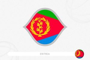 eritrea-flagge für basketballwettbewerb auf grauem basketballhintergrund. vektor