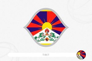 tibet-flagge für basketballwettbewerb auf grauem basketballhintergrund. vektor