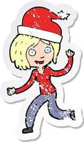 Retro-Distressed-Aufkleber einer Cartoon-Frau, die zu Weihnachten bereit ist vektor