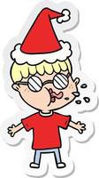 Aufkleber Cartoon eines Jungen mit Brille und Weihnachtsmütze vektor