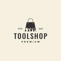 Einkaufstasche mit Werkzeugset-Logo-Design vektor