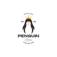 söt pingvin med krona logotyp design vektor